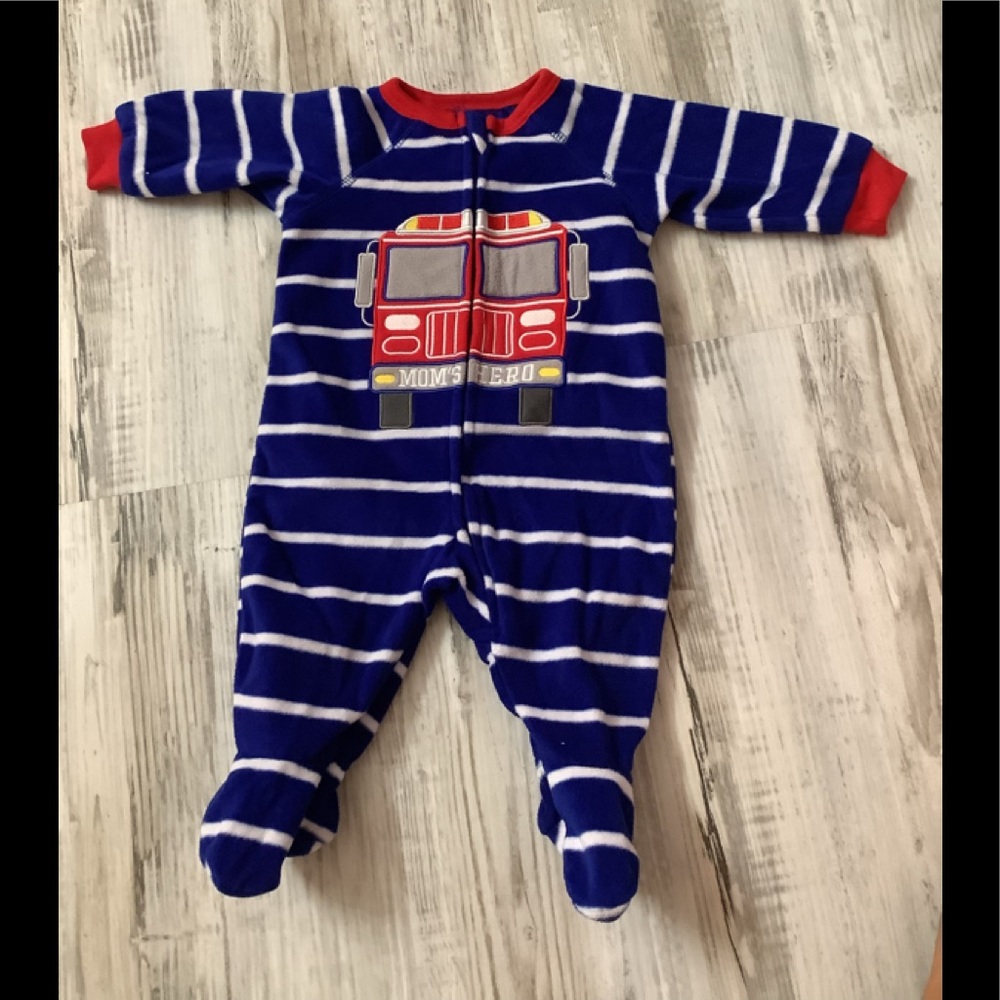 Place blue one-see with fire truck  🚒 0/3 mo zipper front footies